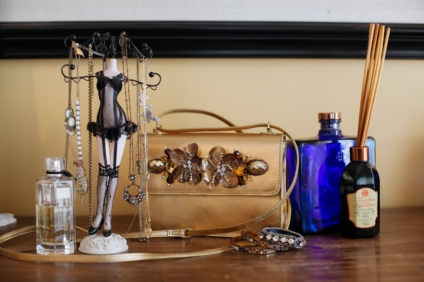 INA Metallic Leather Clutch Bag